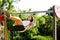 Happy girl in skirt on swing