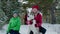 Happy girl teenager embracing dog on winter walk in snowy forest. Friendly family on winter walk together dog. Winter