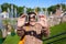 Happy girl tourist shooting selfie in Peterhof in Saint Petersburg