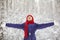 Happy girl walking in the winter outdoors. teen playing with snow. child outdoor.