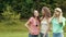 Happy girls friends having fun outdoors in nature.