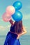 Happy glamor girl with balloons