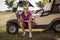 Happy golfer sitting in a golf cart