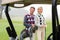 Happy golfing couple smiling