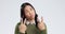 Happy, goofy and face of Asian woman in a studio with funny, comic or funny facial expression. Playful, comedy and