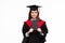 Happy graduated student girl with scroll  on white background