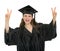 Happy graduation student showing victory gesture