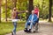 happy granddaughter welcoming her disabled grandfather in wheelchair.