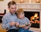 Happy grandfather and grandchild reading a book