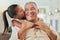 Happy, grandfather and little girl kiss with hug for love and care in family bonding time or generations at home