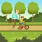 Happy grandfather teaching kid boy to ride the bicycle