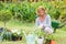 Happy grandmother gardening