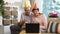 Happy Grandpa and Grandma Congratulate their Children Happy Birthday Using Laptop Video Call