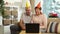 Happy Grandpa and Grandma Congratulate their Children Happy Birthday Using Laptop Video Call