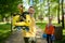 Happy grandparent and grandchild in park, selective focus of roller-skate