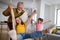 Happy grandparent having fun times with kid at home