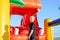 Happy grinning little boy at a fair