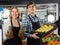 Happy grocery staff at farm food store