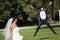 Happy groom in jump
