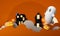 Happy Halloween banner or party invitation background with clouds, bats and glowing pumpkins and full moon