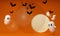 Happy Halloween banner or party invitation background with clouds, bats and glowing pumpkins and full moon