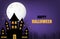 Happy Halloween banner or poster background with big moon and silhouette ghost castle