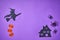Happy Halloween banner violet background with spiders and scary house