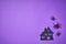 Happy Halloween banner violet background with spiders and scary house. Place for text