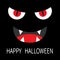 Happy Halloween. Evil Red eyes in dark night. Smiling wicked mouth