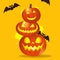 Happy Halloween. Festive background with realistic 3d orange pumpkins with cut scary smile, flying bats. Holiday poster, flyer,