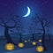 Happy Halloween in forest at night with dead tree, pumpkins, and crescent moon