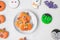 Happy Halloween with funny Cookies; Pumpkin, scary ghost, spooky mummy, bat, frankenstein, dracula and spider. Trick or Threat,