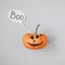Happy halloween. Funny Jack o Lantern with speech bubble on gray background