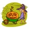 Happy Halloween. Funny little girl rolls a cart with pumpkin