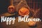 Happy Halloween greeting card. Hand written Happy Halloween text on background of spooky pumpkin Jack-o`-lantern and cobweb in