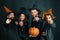 Happy Halloween. Happy friends celebrating Halloween. Close up Halloween portrait of funny group. Surprised group of