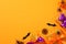 Happy Halloween holiday concept. Halloween banner design with gift boxes, spiders, webs, confetti on orange background