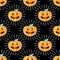 Happy Halloween jackolantern seamless pattern. Jack lantern with rays. Vector illustration isolated on black background.