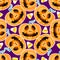 Happy Halloween jackolantern seamless pattern. Jack lantern Vector illustration isolated on purple background.