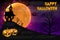 Happy Halloween night background with haunted scary house and full moon