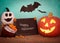 Happy Halloween Pumpkin Still Life Scene with sign board with text, ghost gourd, treats bag, against teal background with bats fly