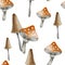 Happy Halloween seamless pattern background. Amanita and toadstools.