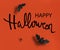 Happy Halloween text on orange background.