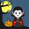 Happy Halloween. A vampire girl in the style of a cartoon stands next to a tree. Halloween pumpkin with sweets, full moon at night