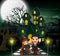 Happy halloween vampire and witch in front of the haunted house with full moon background