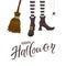 Happy Halloween with witches legs and broom