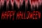 Happy Halloween written on bloody background