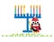 Happy Hanukkah card. Cute penguin standing near a blue menora holding green candle