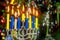 Happy Hanukkah. Low key image of jewish holiday with menorah the night view out focus