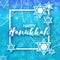 Happy Hanukkah with origami blue Magen David stars.